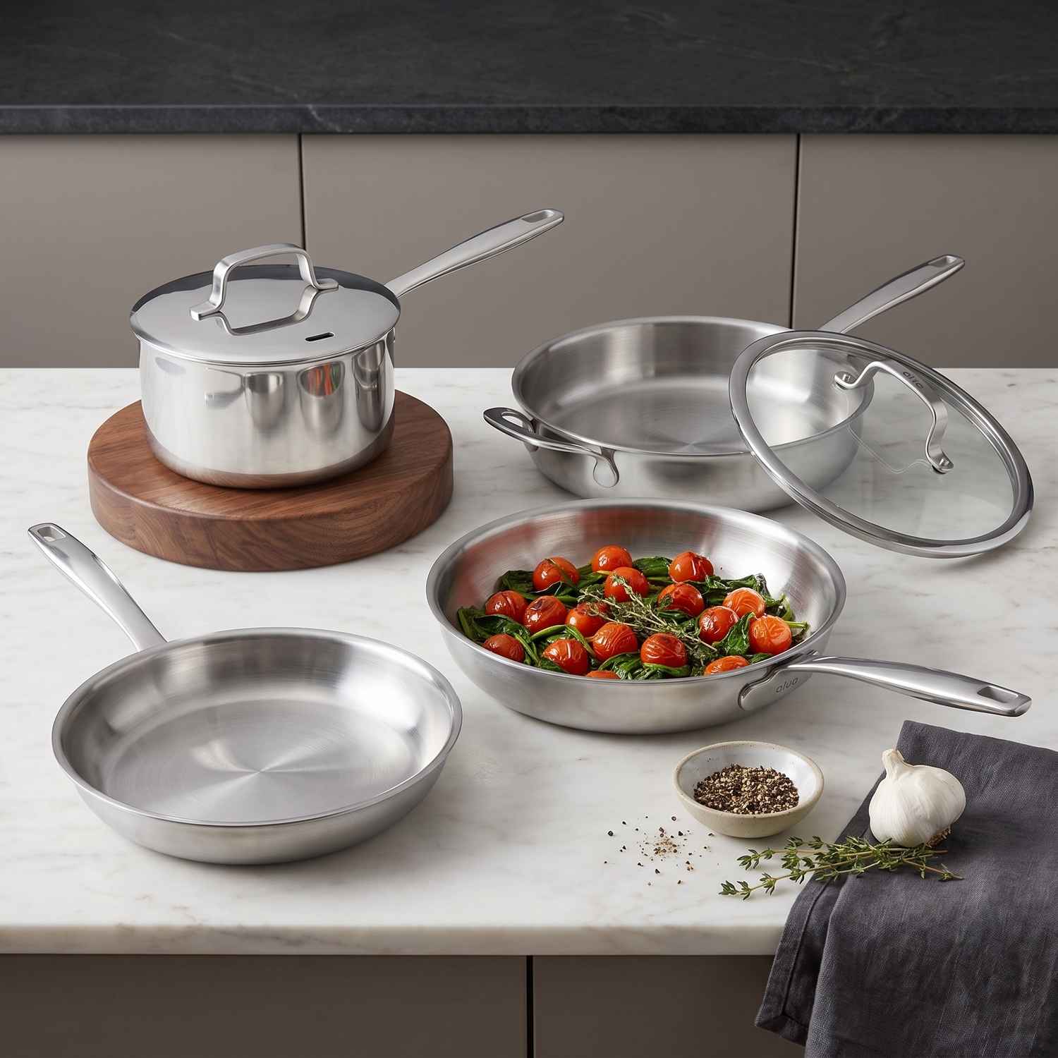 Alva Maestro stainless steel cookware arranged on a kitchen counter