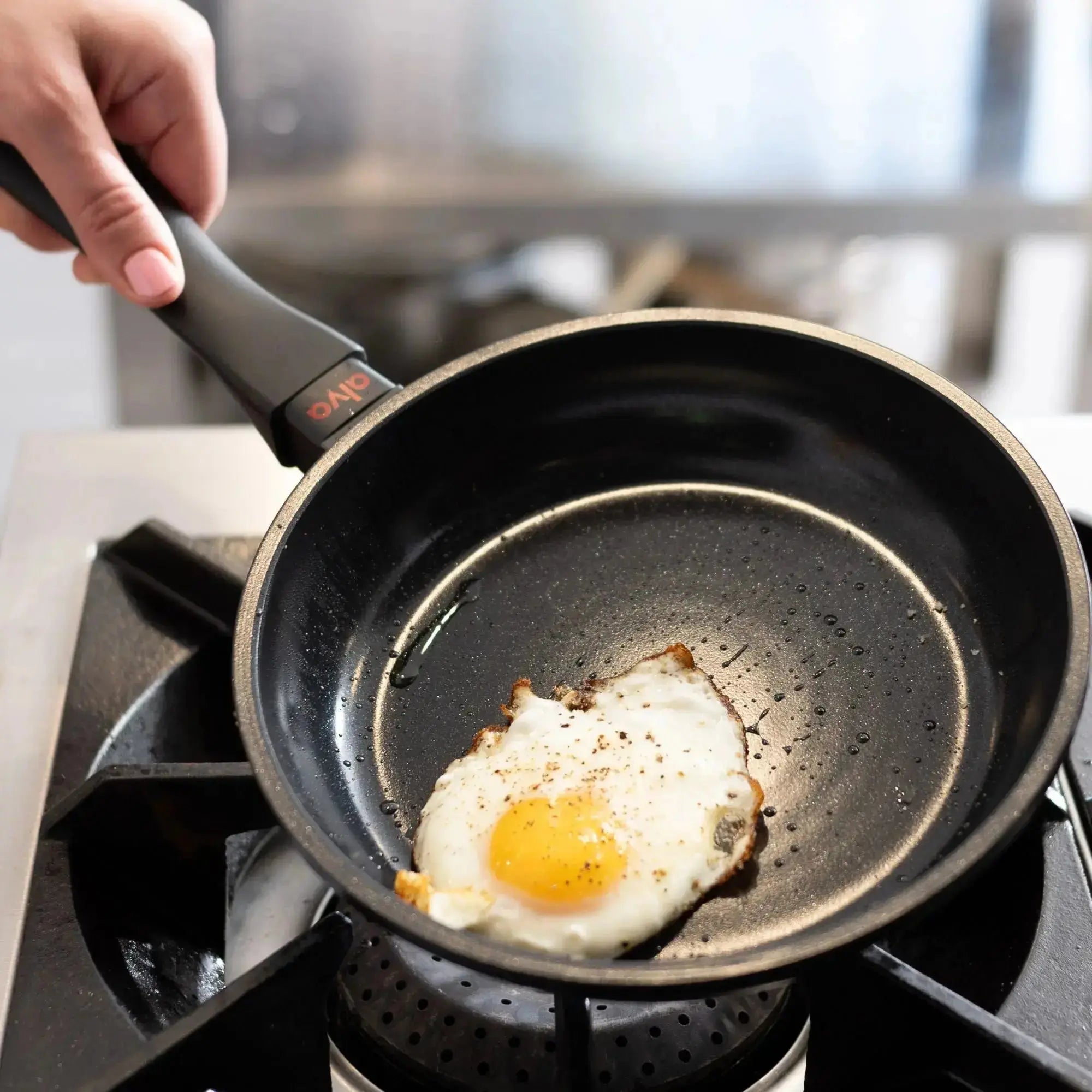 Alva Energy ceramic nonstick frying pan cooking an egg