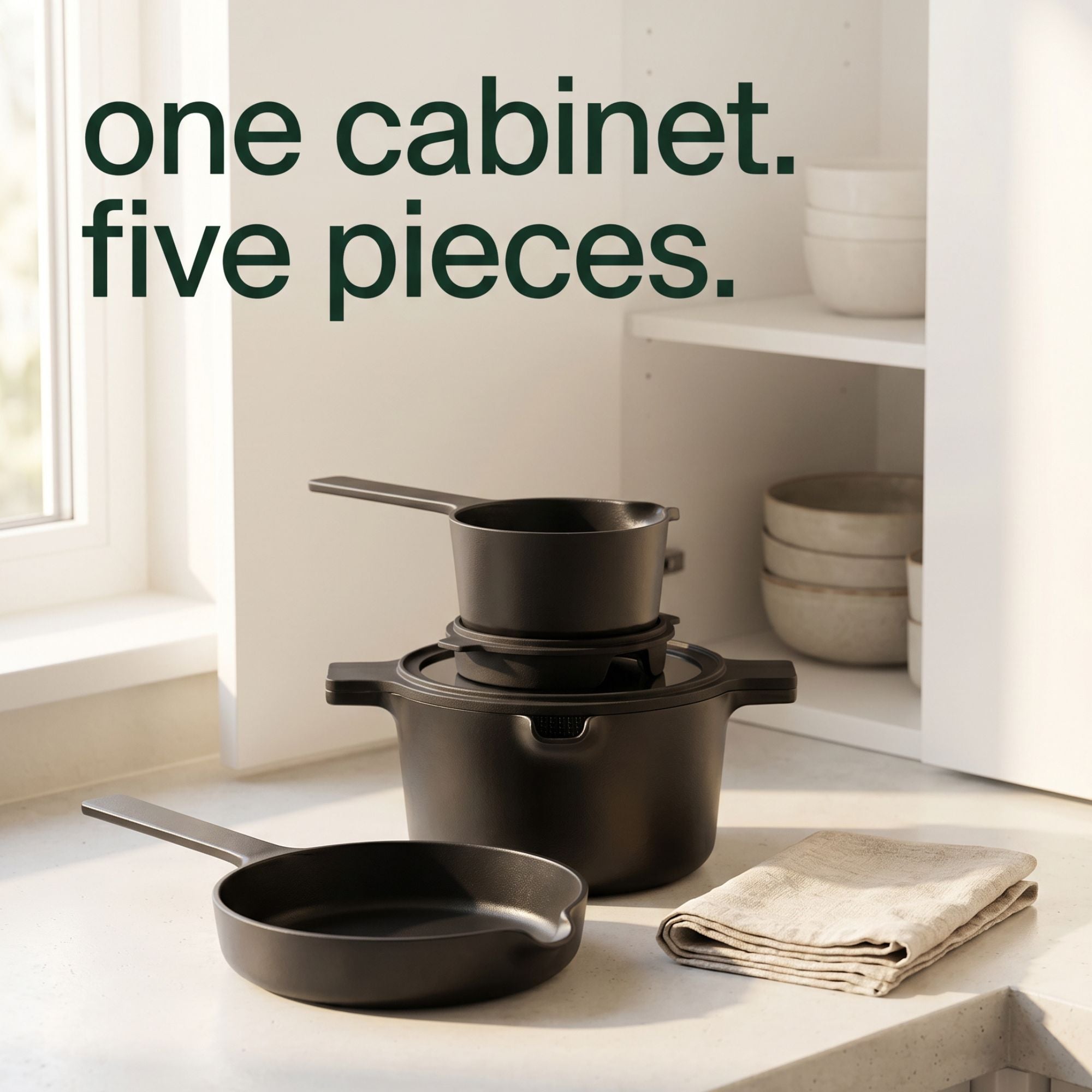 Alva Neat nesting cookware stored compactly in one kitchen cabinet