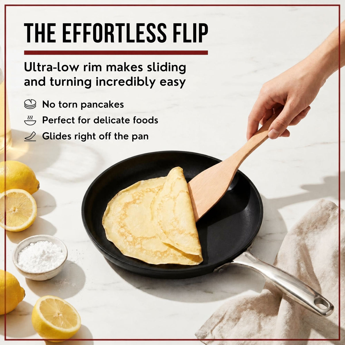 Folding a crepe with a wooden spatula in the low-rim Alva Maestro ceramic nonstick crepe pan