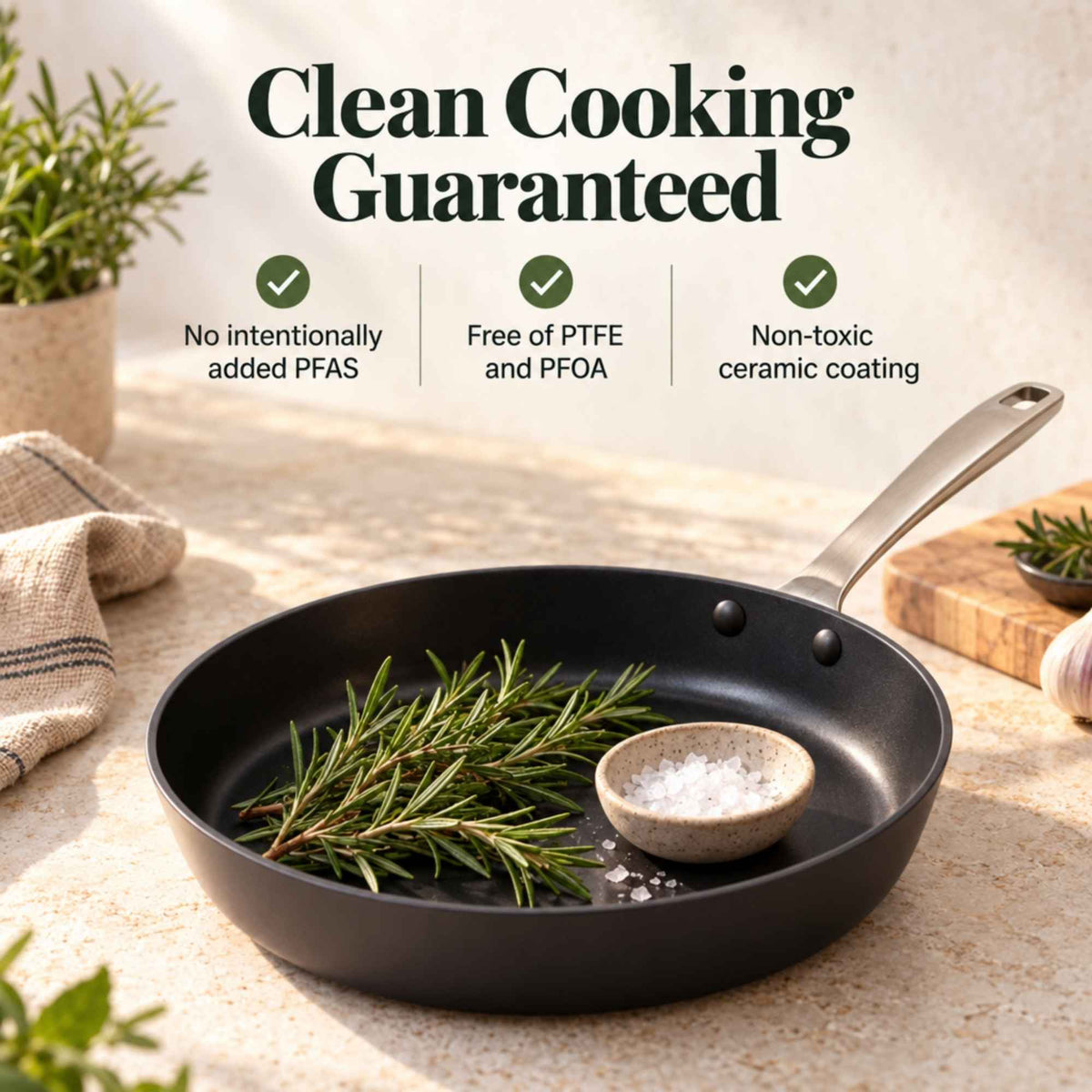Maestro ceramic nonstick frying pan with rosemary and sea salt on a countertop, made without PFAS, PTFE or PFOA