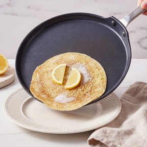 Alva ceramic nonstick crepe pan releasing a pancake