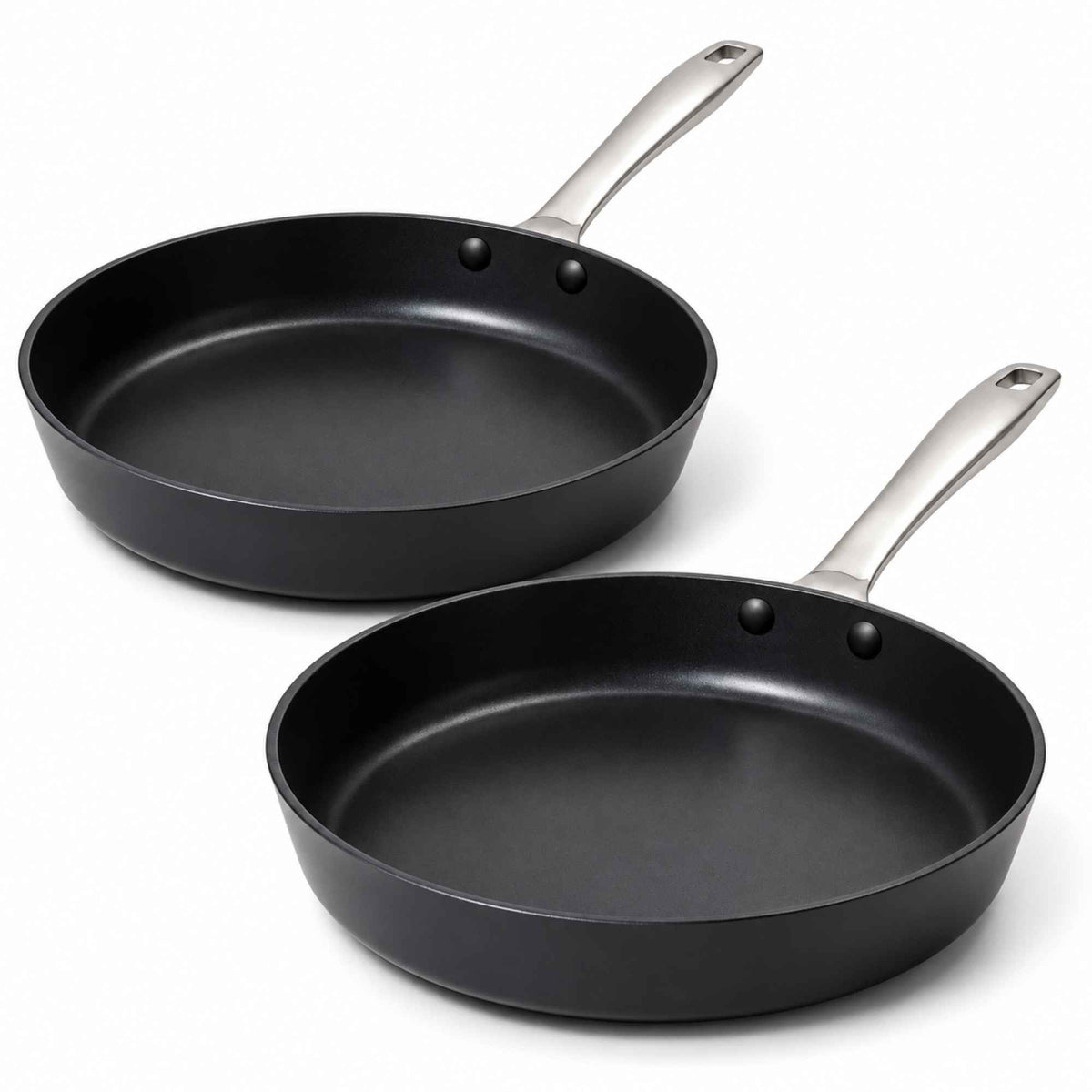 Pair of Alva Maestro black ceramic nonstick frying pans with stainless steel handles on a white background