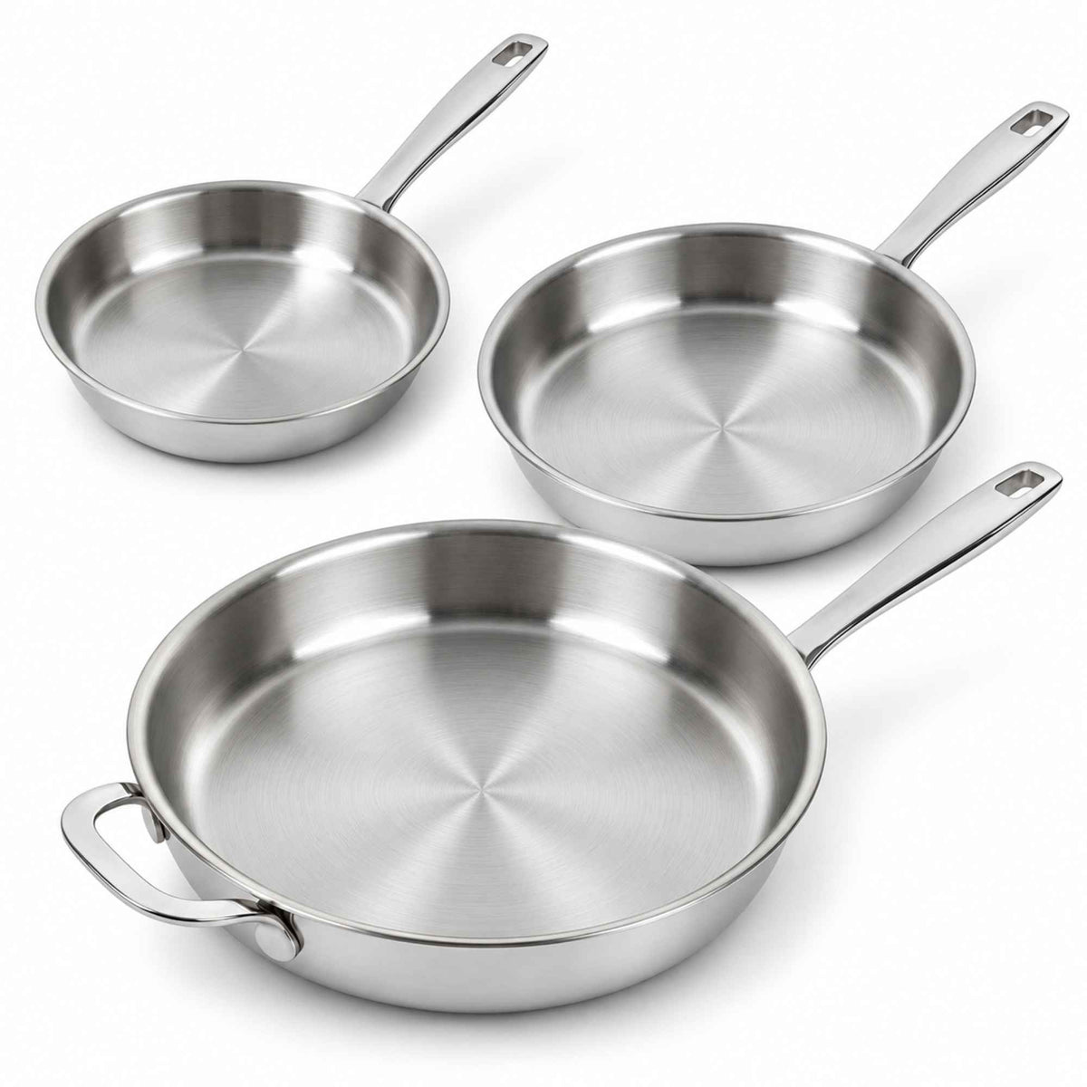 Three Alva Maestro 5-ply stainless steel frying pans in graduated sizes, the largest with a helper handle, on a white background