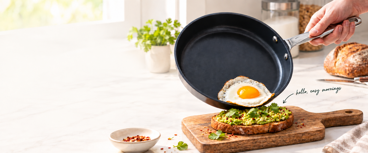 Alva ceramic nonstick pan serving an egg over avocado toast in a sunlit kitchen