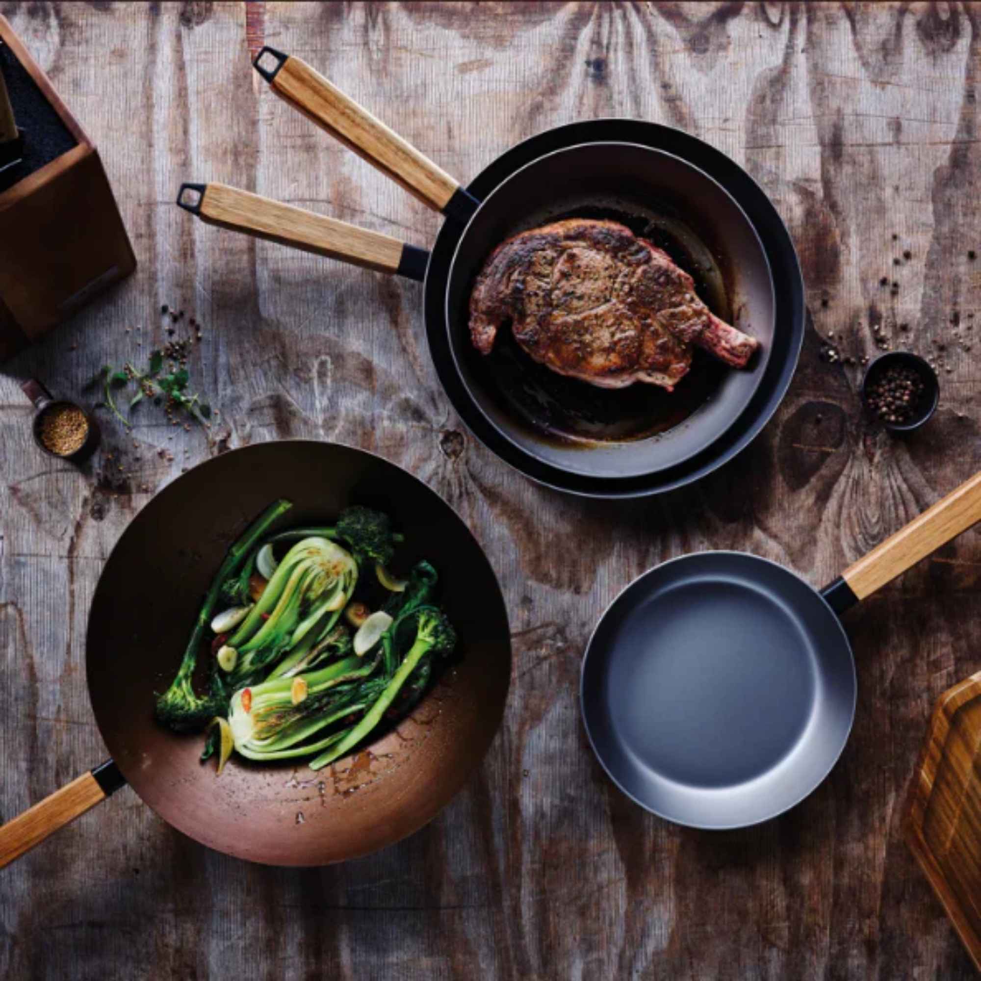 Alva Forest carbon steel cookware serving steak and vegetables
