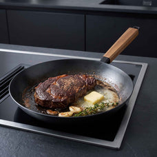 Alva Forest carbon steel frying pan searing steak on induction