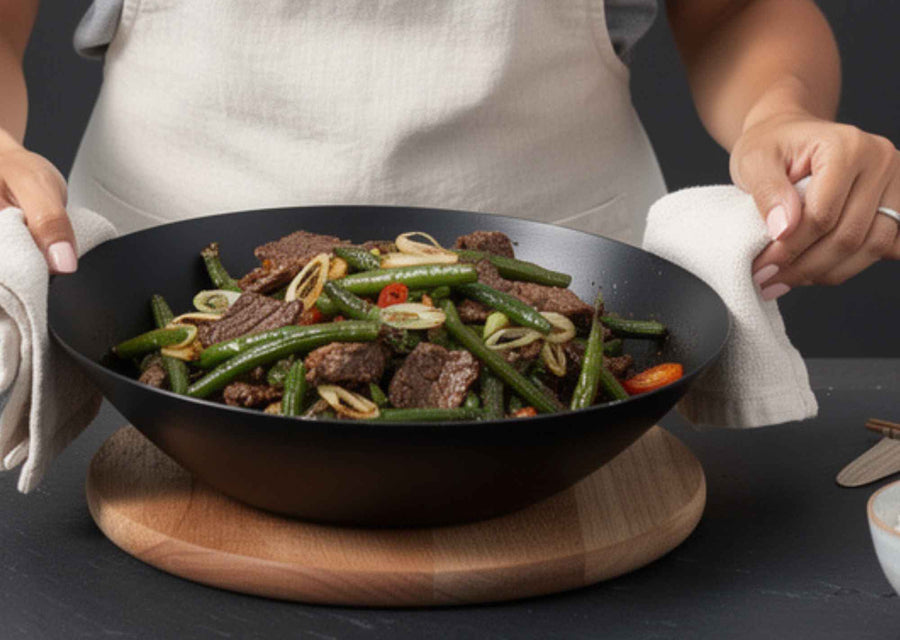 Alva Forest carbon steel wok serving beef and vegetables