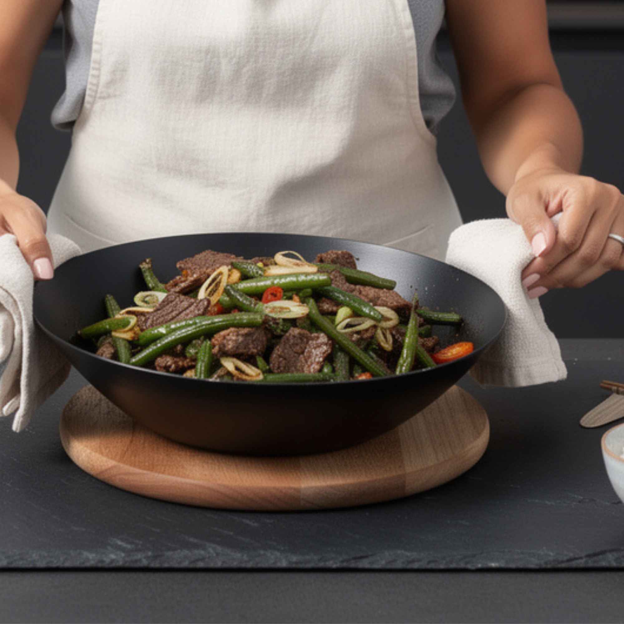 Alva Forest carbon steel wok serving beef and vegetables