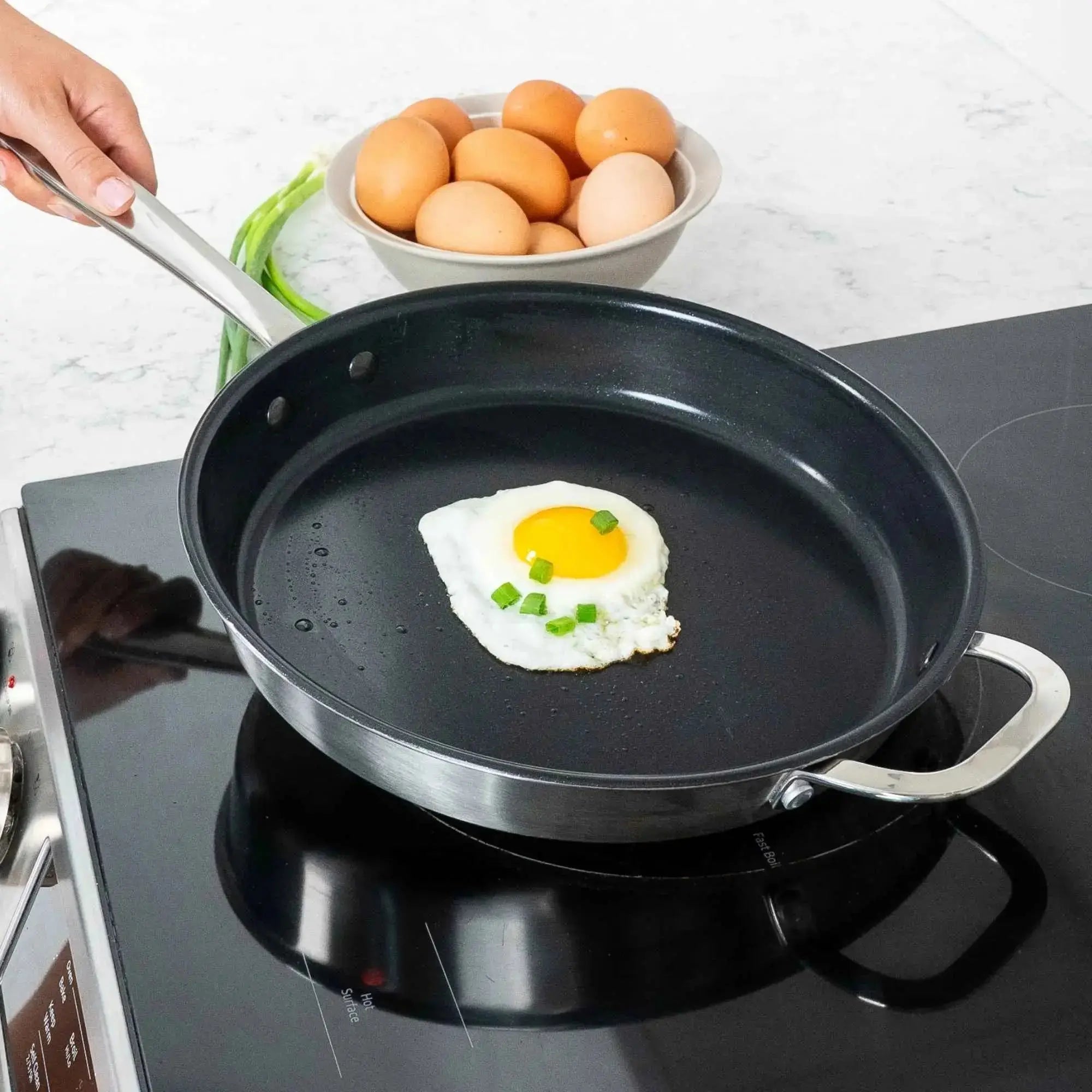 Alva ceramic nonstick frying pan cooking an egg on induction