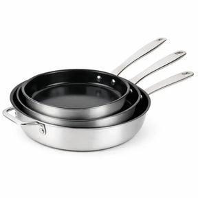 Alva three ceramic nonstick stainless frying pans nested on white