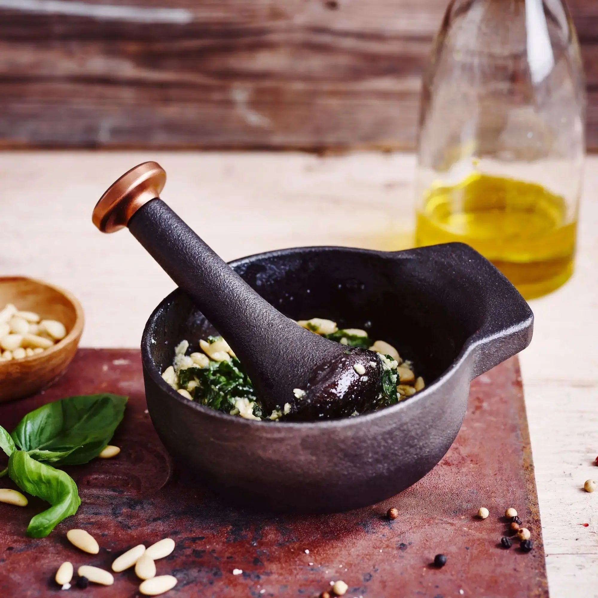 Alva Nori mortar and pestle crushing herbs and garlic