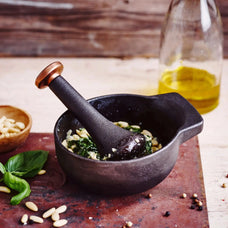 Alva Nori mortar and pestle crushing herbs and garlic
