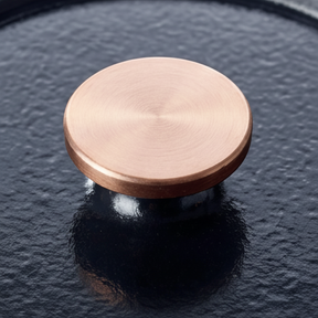 Alva Nori round Dutch oven copper-tone lid knob detail